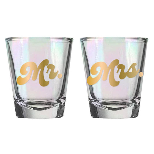 Set of two wedding shot glasses with "Mr." and "Mrs." lettering by Soiree Sisters, featuring elegant design and clear glass.