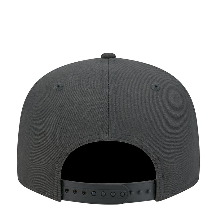 Dark gray baseball cap with snapback strap visible at the back opening.