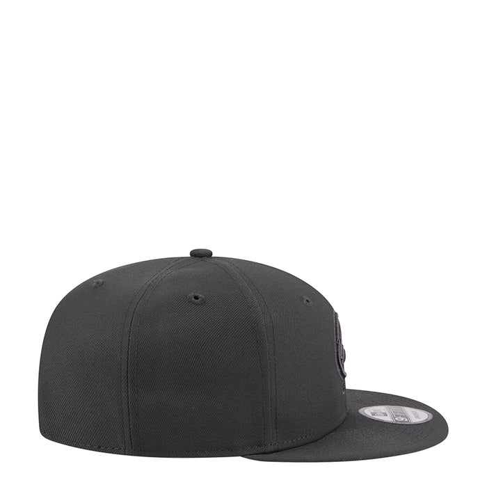 Dark charcoal baseball cap with tonal side patch and curved brim